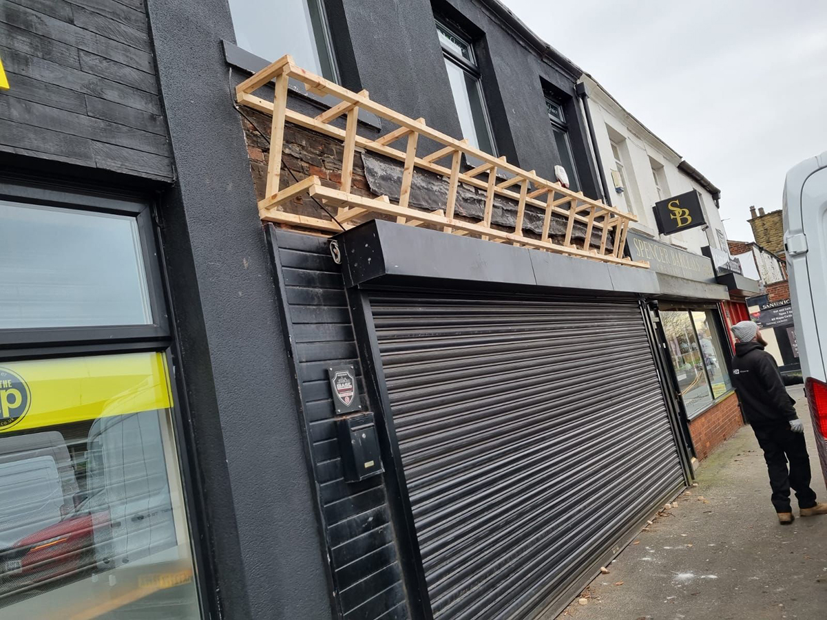 New illuminated shop front sign for Gin & Juice by