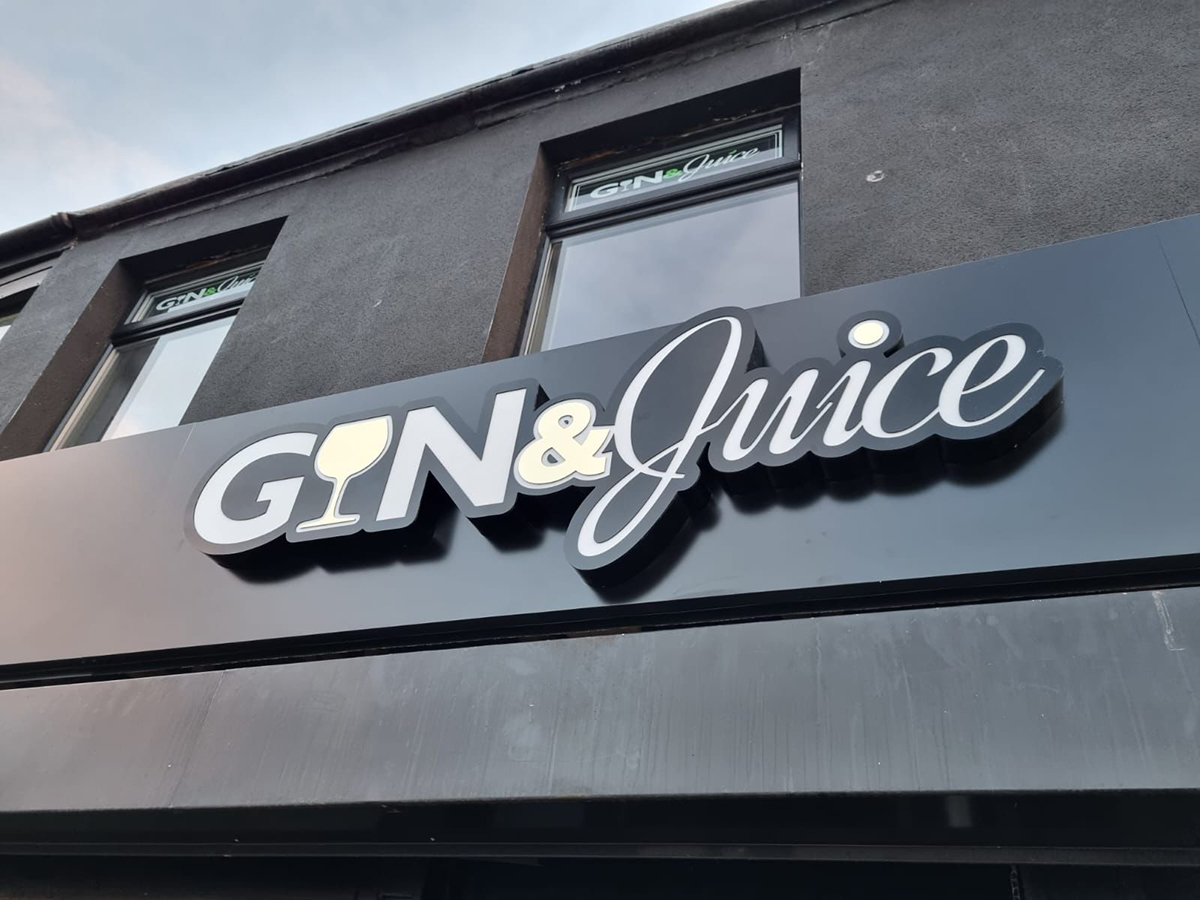 New illuminated shop front sign for Gin & Juice by