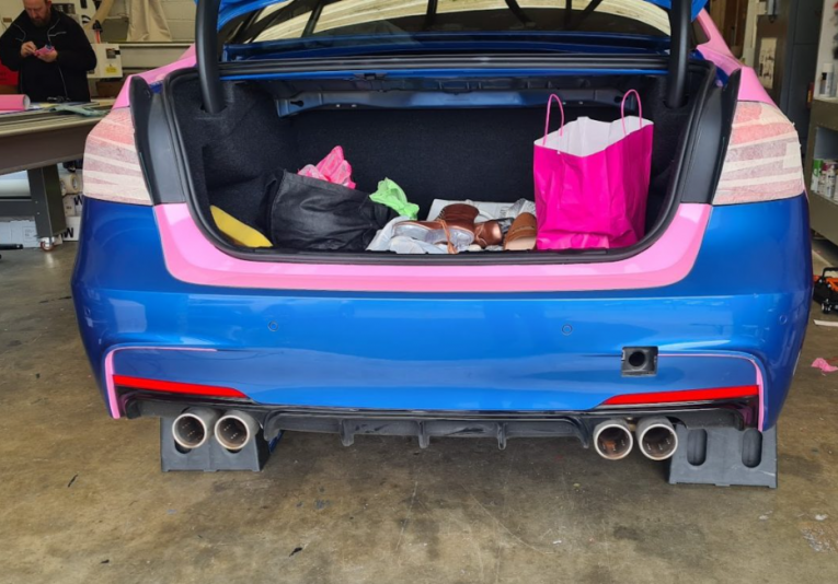 Pink-vinyl-wrap-bmw-car-rear-bumper-inlay-wrapped