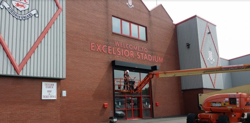 Football-Stadium-Signs-Composite-routered-letters-cherrypicker