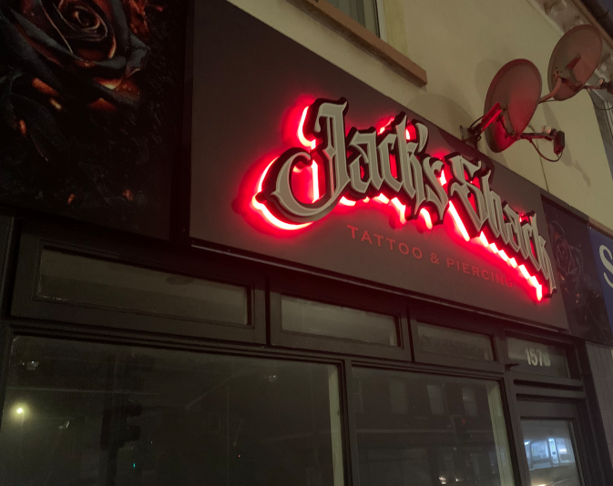 Tattoo-shop-sign-led-illuminated-close-up